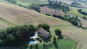 an aerial view of a house in a field at Casa Onda in Senigallia