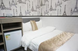 Postelja oz. postelje v sobi nastanitve Vve Vve Hotel