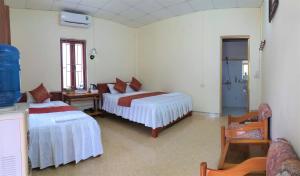 Giường trong phòng chung tại Yen Binh Homestay