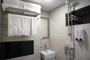 Kopalnica v nastanitvi Vve Vve Hotel