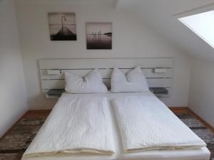 Posteľ alebo postele v izbe v ubytovaní Apartment zur Schmiede - by myNests