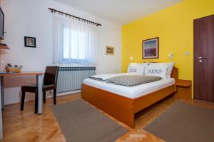 Postel nebo postele na pokoji v ubytování Apartments Erik B&B Adults only