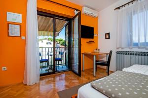 Postel nebo postele na pokoji v ubytování Apartments Erik B&B Adults only
