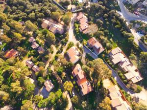 an aerial view of a subdivision of houses at Cala di Sole in Algajola