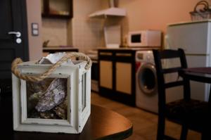 A kitchen or kitchenette at Ivanovi Apartments