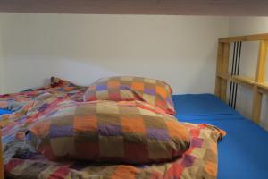 Katil atau katil-katil dalam bilik di SnowBunnys BackPackers Hostel