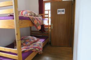 Katil atau katil-katil dalam bilik di SnowBunnys BackPackers Hostel