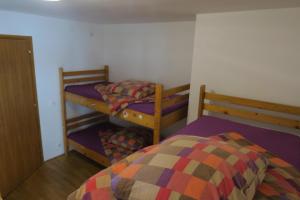 Katil atau katil-katil dalam bilik di SnowBunnys BackPackers Hostel