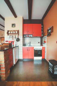 Kuchyň nebo kuchyňský kout v ubytování Studio apartman Vuković
