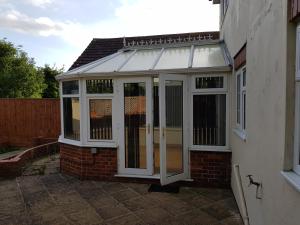 an extension to a conservatory on a house at Spacious Swindon 5 bedroom house - sleeps up to 10 in Swindon