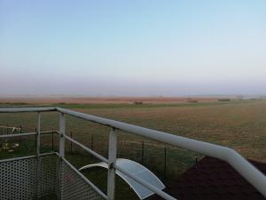 a view of a field from the roof of a house at les fermiers in Giremoutiers