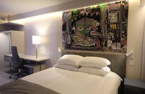 Letto o letti in una camera di Link Hotel & Hub By Dan Hotels