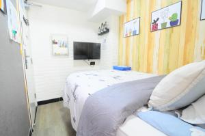 TV a/nebo společenská místnost v ubytování Big Wave Travel