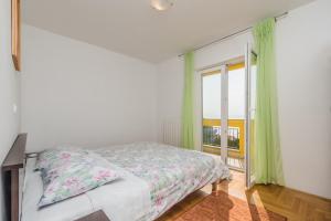 Postel nebo postele na pokoji v ubytování Apartment Sea & Island view