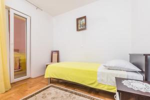 Postel nebo postele na pokoji v ubytování Apartment Sea & Island view