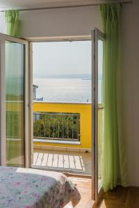 Postel nebo postele na pokoji v ubytování Apartment Sea & Island view