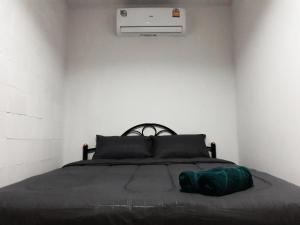 Letto o letti in una camera di P & T Hostel