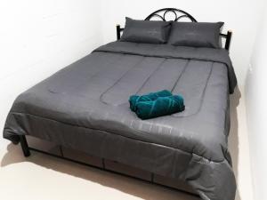 Letto o letti in una camera di P & T Hostel