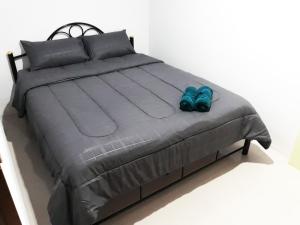 Letto o letti in una camera di P & T Hostel