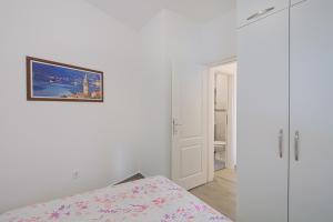 Ένα ή περισσότερα κρεβάτια σε δωμάτιο στο Apartment Kotor Bay +17 φωτογραφίες