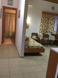 Posteľ alebo postele v izbe v ubytovaní VILLA EIRINI