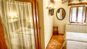 Katil atau katil-katil dalam bilik di Casa rural El Abejaruco