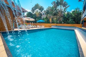 Bazén v ubytování Brisa do Caitá Praia Hotel nebo v jeho okolí