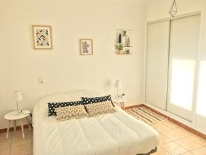 Un ou plusieurs lits dans un hébergement de l'établissement Superbe ! Appart T3 - Vue mer - Garage