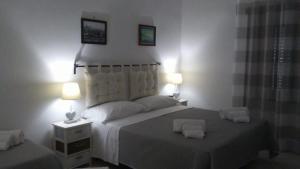 Posteľ alebo postele v izbe v ubytovaní Casa Luna