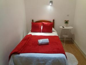 A bed or beds in a room at Casa de Huéspedes Prada