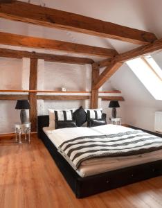 Posteľ alebo postele v izbe v ubytovaní Apartamenty "BULWAR GORZOW"