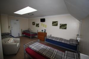 Postel nebo postele na pokoji v ubytování Ballater Hostel