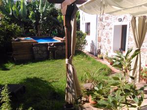 Vonkajšia záhrada v ubytovaní Villa Canaria piscina jacuzzi jardín