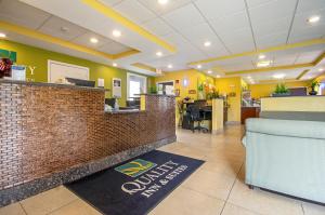 a lobby of a dental office with yellow walls at Quality Inn & Suites Glenmont - Albany South in Glenmont +40 photos