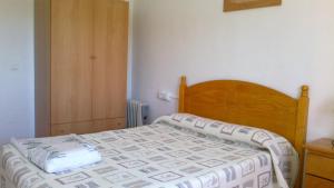 Posteľ alebo postele v izbe v ubytovaní Apartamentos Rurales Las Colinas