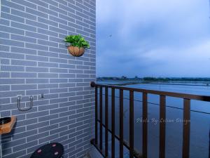 Balkón nebo terasa v ubytování Four Seasons Homestay