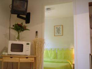 TV a/nebo společenská místnost v ubytování Residence Motel Corsicana