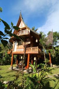 Vrt pred nastanitvijo Padi Ecolodge