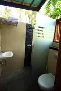 Vannituba majutusasutuses Padi Ecolodge