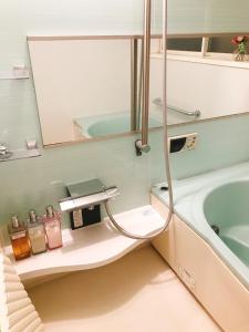 Koupelna v ubytování HimawariRyokanひまわり旅館