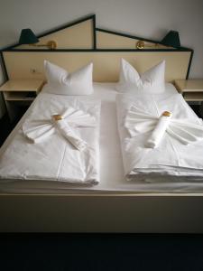 Postel nebo postele na pokoji v ubytování Hotel 3 Linden