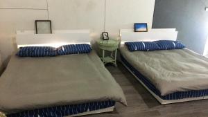 Кровать или кровати в номере Chen The House