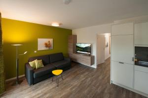 Kuchyň nebo kuchyňský kout v ubytování Appartements Marlene