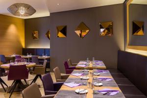 Restauracja lub miejsce do jedzenia w obiekcie Pullman Basel Europe