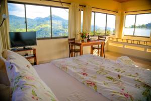 Voodi või voodid majutusasutuse The Views Kandy - 360 Mountain View toas