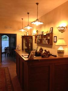 a kitchen with a counter with lights on it at il casale san martino in Norcia