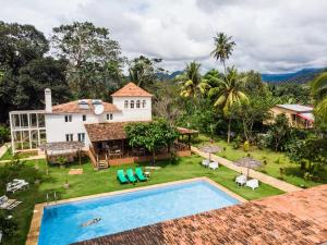 an aerial view of a villa with a swimming pool at Roça Santo António Ecolodge in São Tomé