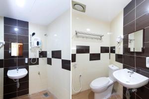 Koupelna v ubytování Hotel Raja Bot