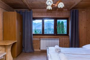 Posteľ alebo postele v izbe v ubytovaní udanypobyt Apartamenty Przy Lesie 2