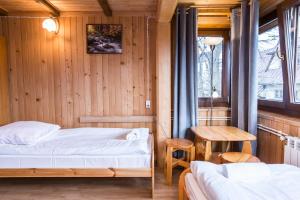 Posteľ alebo postele v izbe v ubytovaní udanypobyt Apartamenty Przy Lesie 2